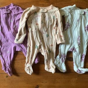 Carter’s newborn two-way zip long sleeve onesie bundle